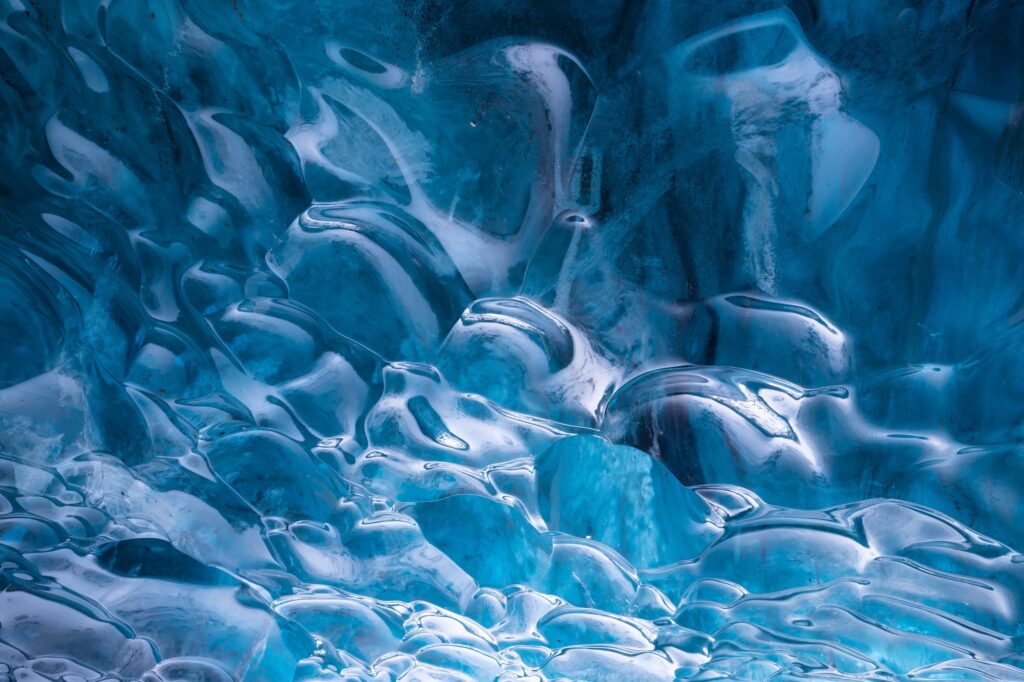 The Ice Cave in Iceland. Crystal Ice Cave. Vatnajokull National Park. Inside view of the ice cave